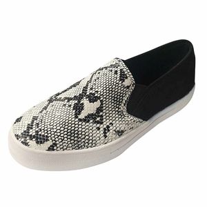 Women snake print loafers
